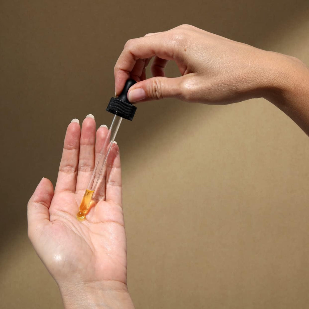 Cliganic Pumpkin Seed Oil pump-dispense image shows easy, mess-free application.