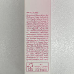 CLIO PROFESSIONAL size comparison next to coin illustrating compact travel-friendly tube