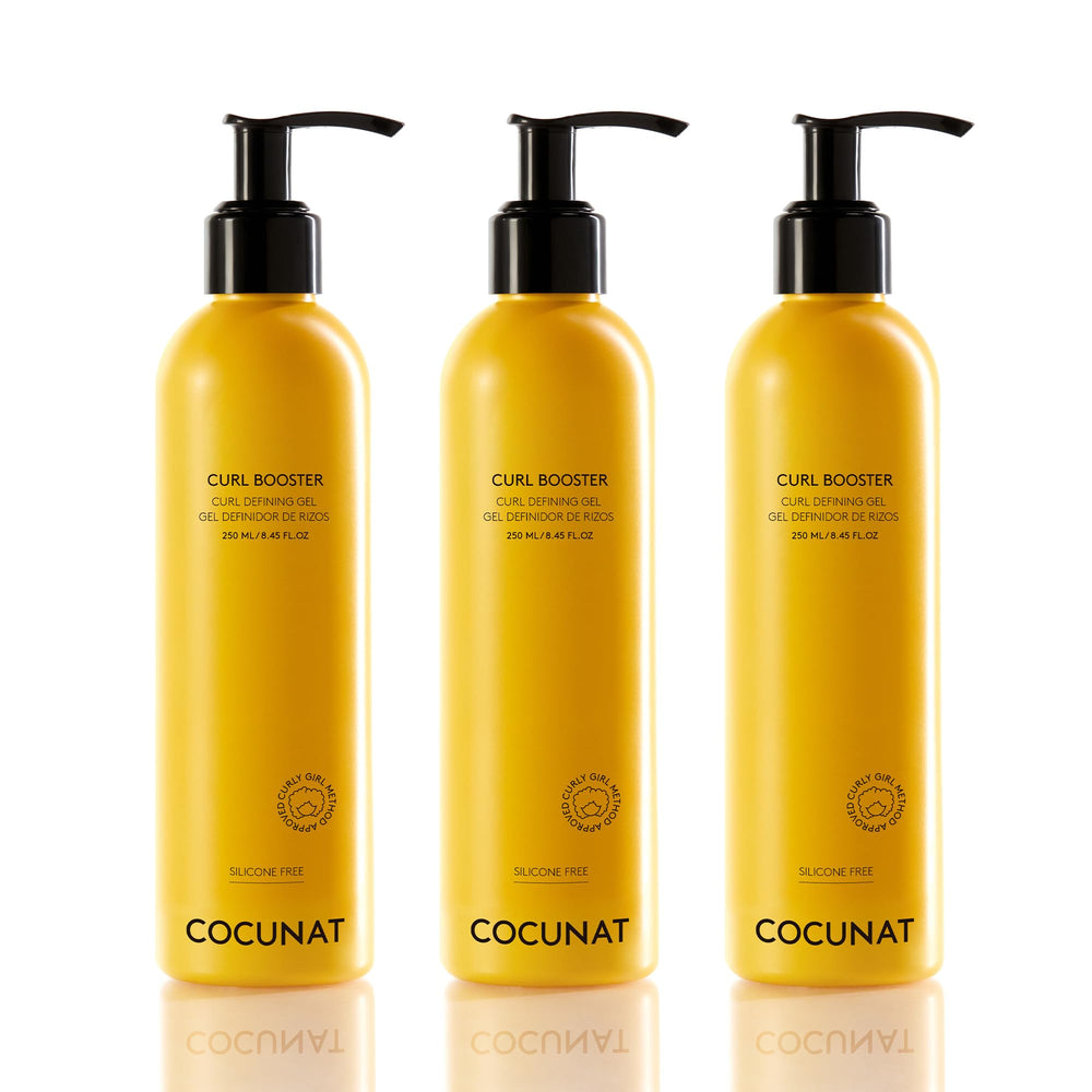 COCUNAT 3 Curl Booster bottle shows frizz control and deep hydration for defined curls.
