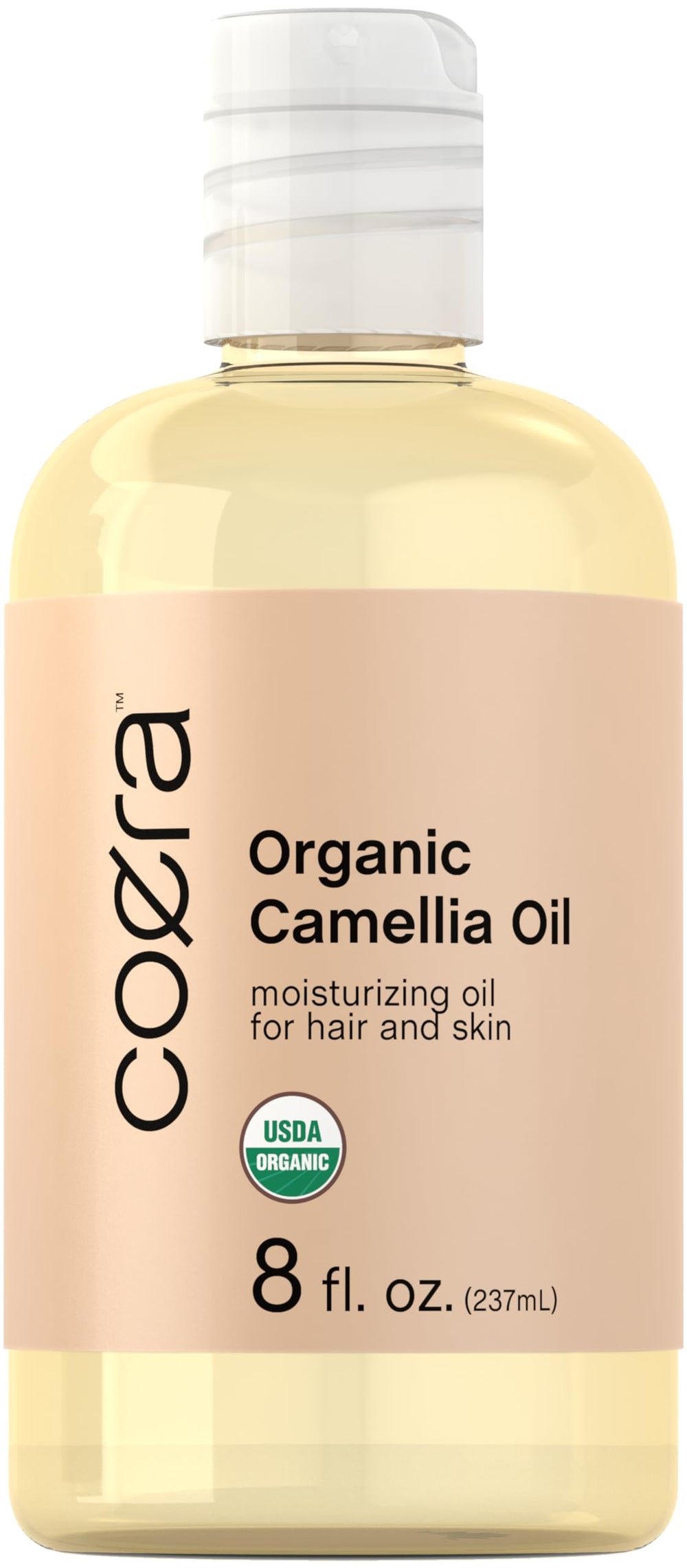 Coera Camellia Oil bottle highlighting organic formula for hair and skin.