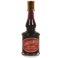Col Conk Bay Rum Aftershave bottle, tropical bay leaves and Jamaican rum scent for post-shave freshness.