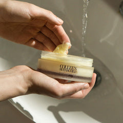 COLLEEN ROTHSCHILD Mini Radiant Cleansing Balm face cleanse application demonstrates makeup dissolution.