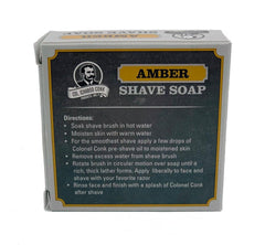 Colonel Conk Amber shaving soap lather forms with a brush for a smooth shave.