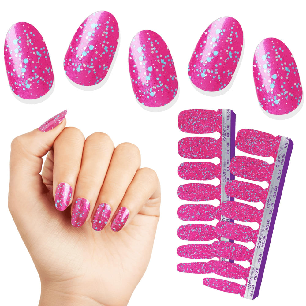 Color Street Bauble & Bright hot pink glitter nails with blue sparkle for festive holiday glam.