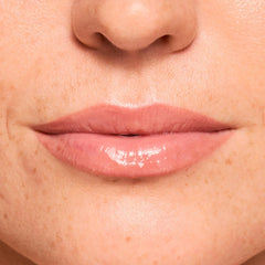 ColourPop Fresh Kiss formula close-up highlighting peptides and hyaluronic acid ingredients.