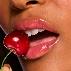 ColourPop Fresh Kiss applicator on lips delivering a shiny, even finish