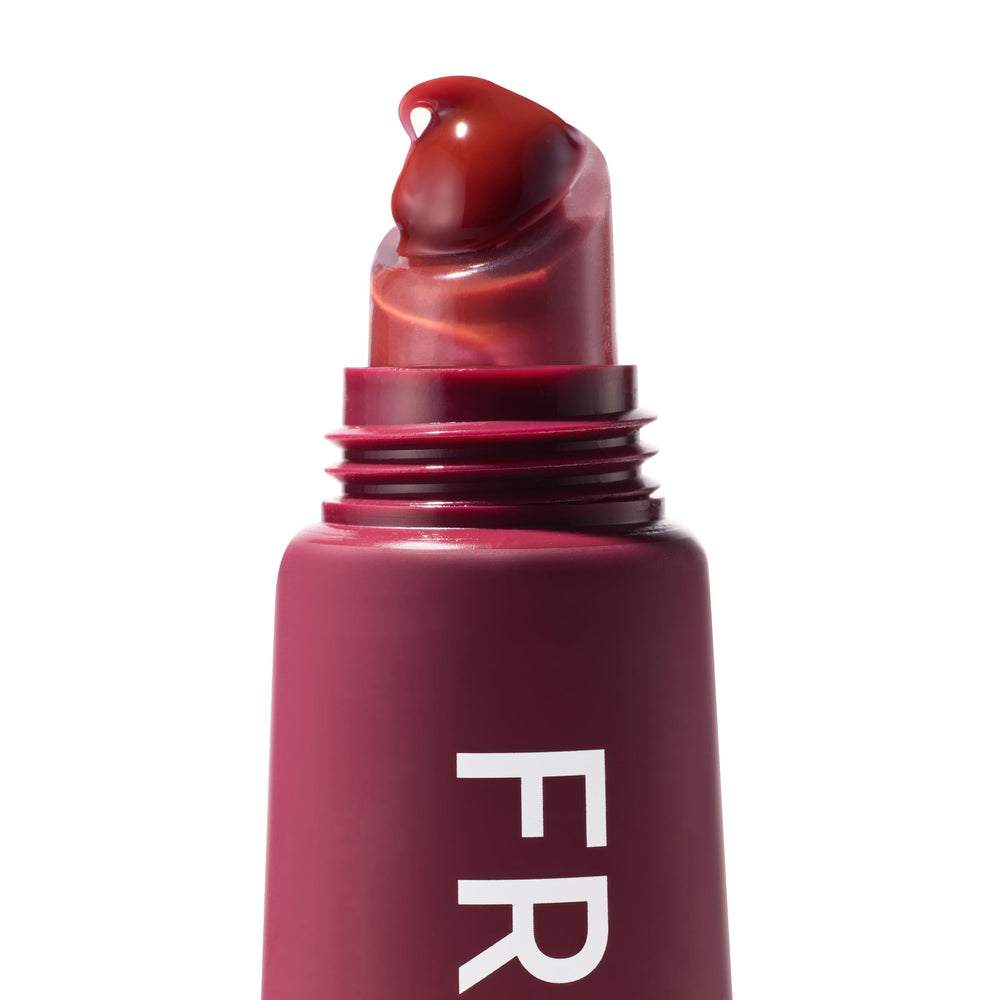 ColourPop Fresh Kiss application closeup demonstrates easy swipe-on moisture and glossy finish