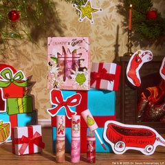 ColourPop Grinchmas lip gloss trio in eco-friendly packaging emphasizes cruelty-free vegan formula.