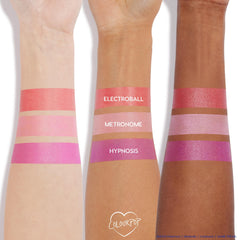 ColourPop Hypnosis cream blush on cheeks shows lightweight glide and natural look.