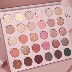 ColourPop Smoke N Roses eyeshadow pans in rosy hues for quick swatches.