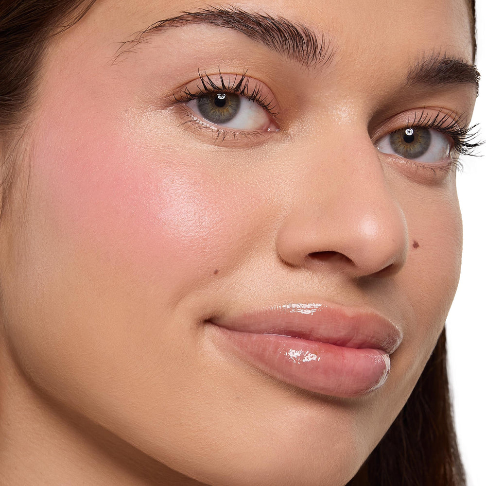 Blush applied with fingertip showing seamless, second-skin finish.