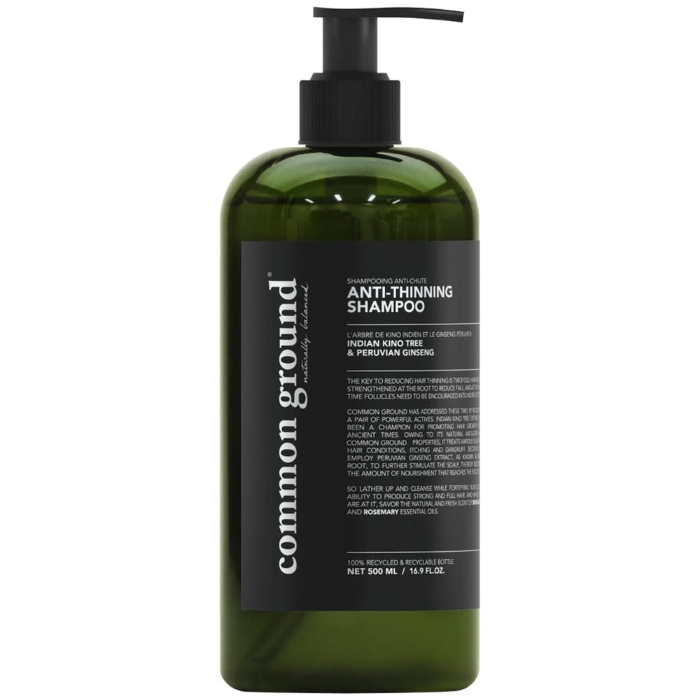 Common Ground shampoo bottle highlighting bergamot-rosemary scent for a refreshing wash.