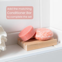 Community Goods Shampoo Bar in recyclable packaging supports a plastic-free routine.