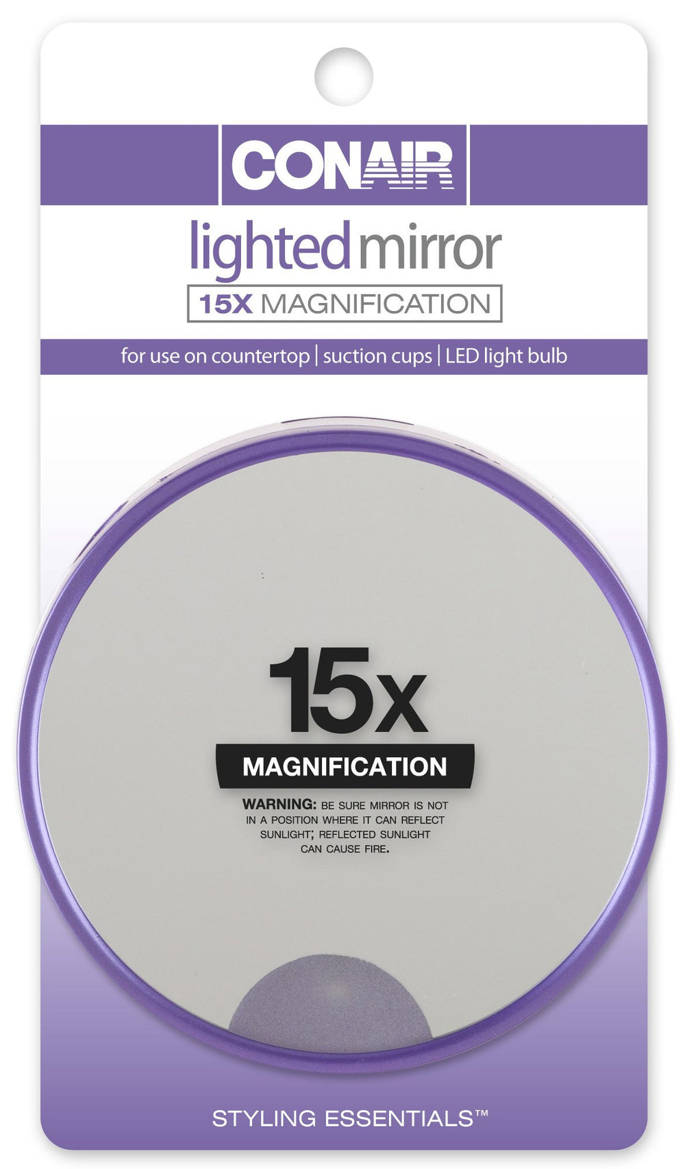 Conair 15x magnification lighted suction mirror attached to a smooth surface for precise makeup detail