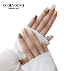 CoolYOUNG handmade nails with adhesive tabs enable quick three-minute application.