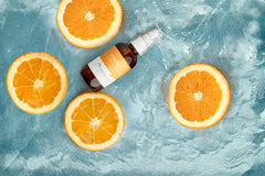 CosMedica Vitamin C Super Serum dropper applying precision and quick absorption.