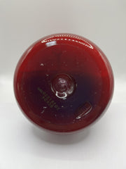 COSMOCOS REDFLO 700 ml bottle on shelf.