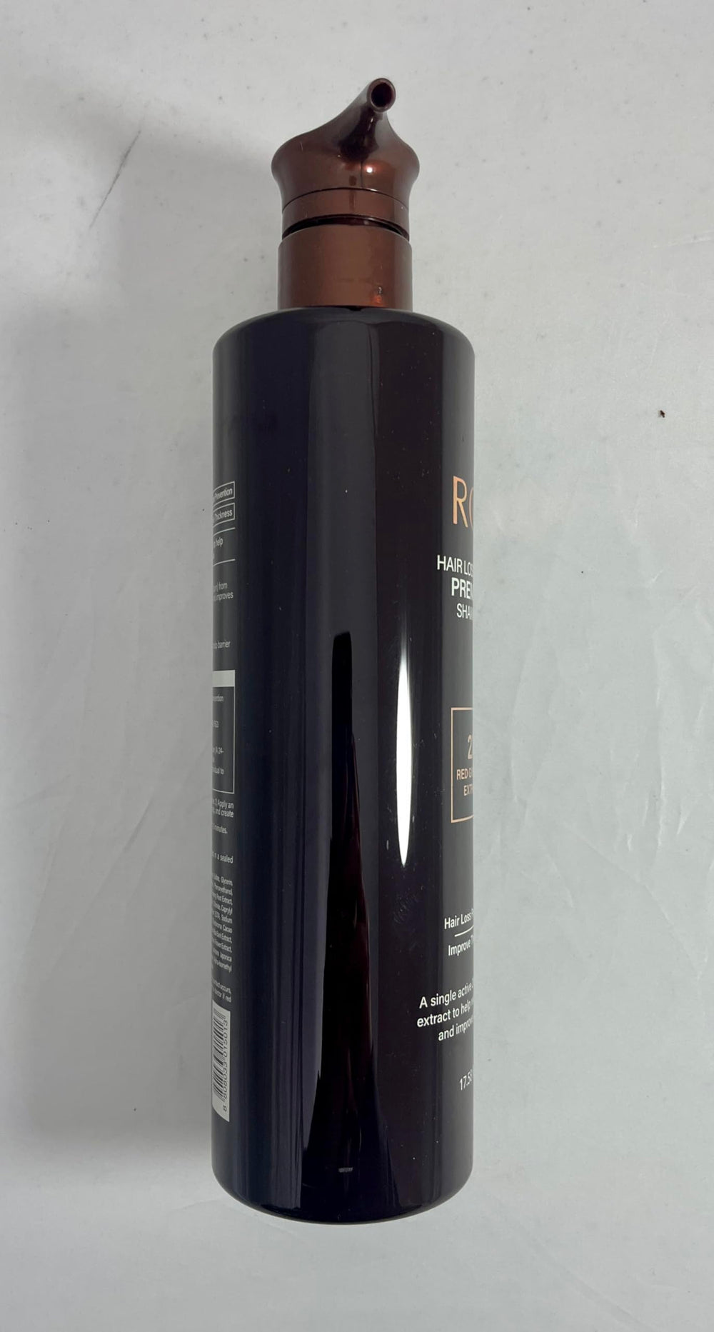COSMOCOS RG3 bottle suggests stronger-looking hair strands.