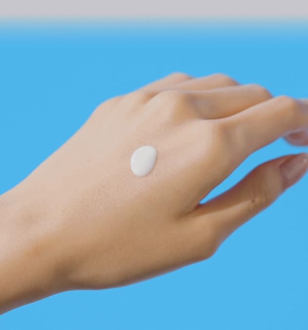Cotton Labo ANESSA sunscreen milk application swirl on skin