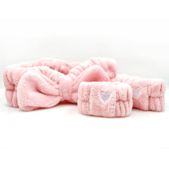 The Crème Shop Spa Teddy Cuff Set absorbs moisture to protect clothing during skincare.