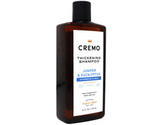 Shower-shelf display with Cremo bottle emphasizes spa-like juniper eucalyptus aroma
