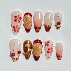CTTHNBD almond nails full-cover with 3D gold flower detail for elegance