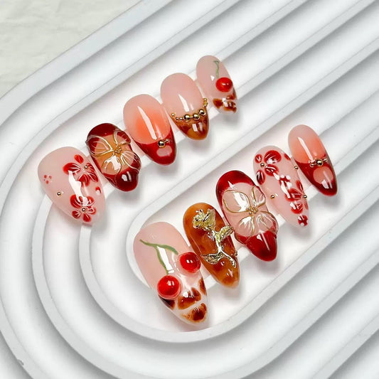 CTTHNBD almond press-on nails medium with 3D gold flowers for a quick chic manicure