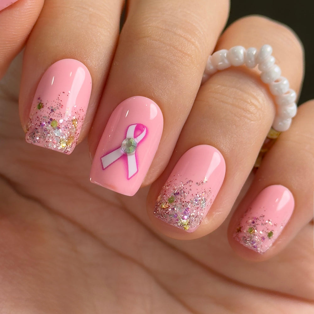 Curvlife press-on nails with pink ribbon glitter and glossy finish for instant glamour.