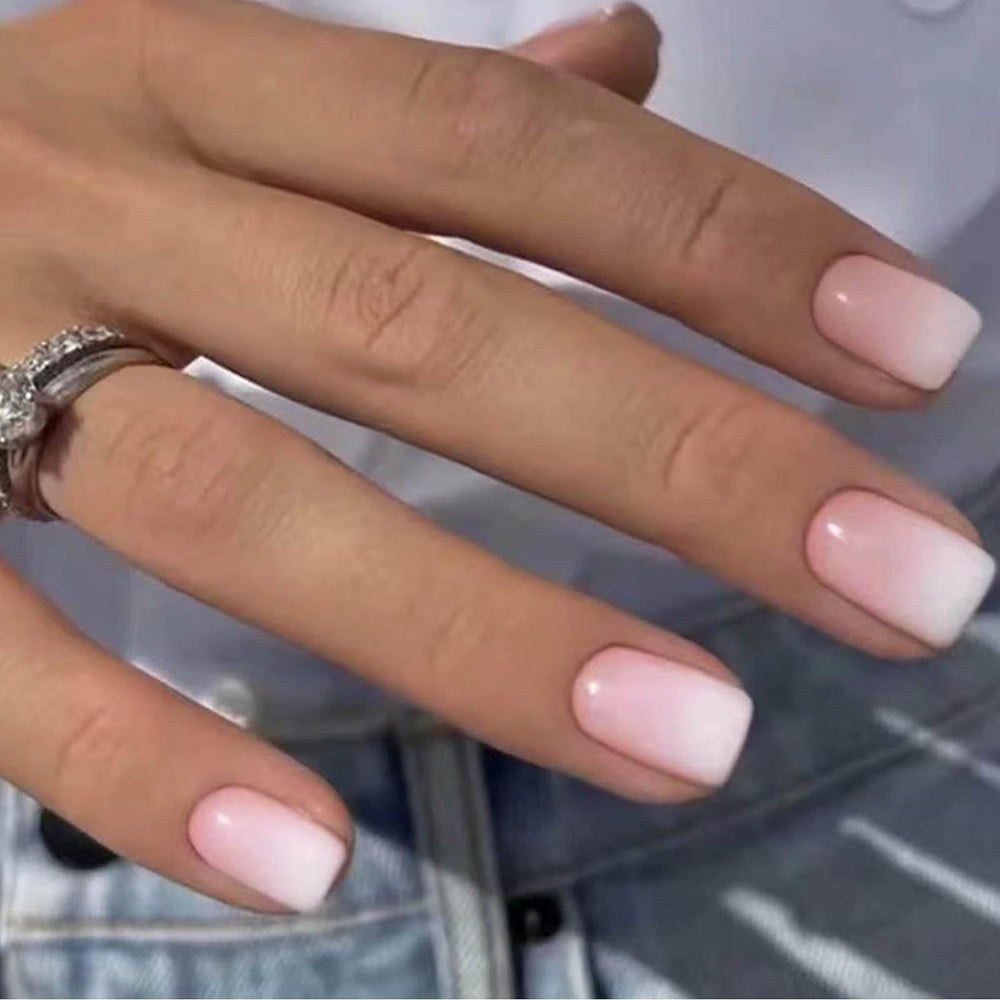 CurvLife press-on nails in beige, white, pink with apricot design for a chic, quick manicure.