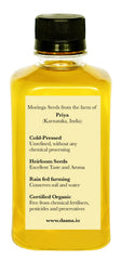 DAANA Moringa Oil application on face for soft, smooth skin.