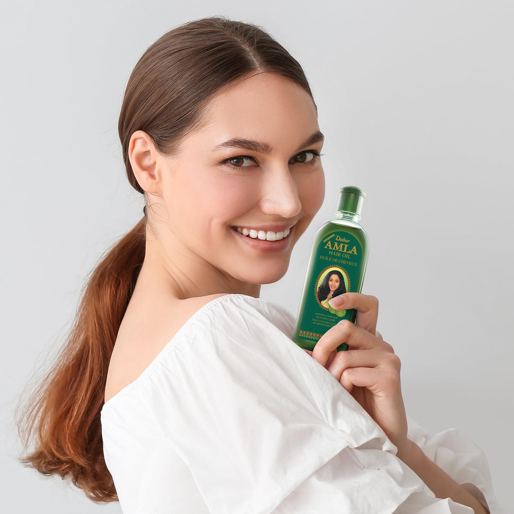 Dabur Amla Hair Oil celebrity endorsement context implies trusted heritage.