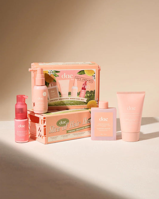 DAE Freshly Squeezed Wash Set bottle closeup for a refreshing daily cleanse.