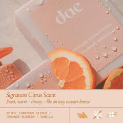 DAE Signature Conditioner cap and pour spout close-up for easy application.