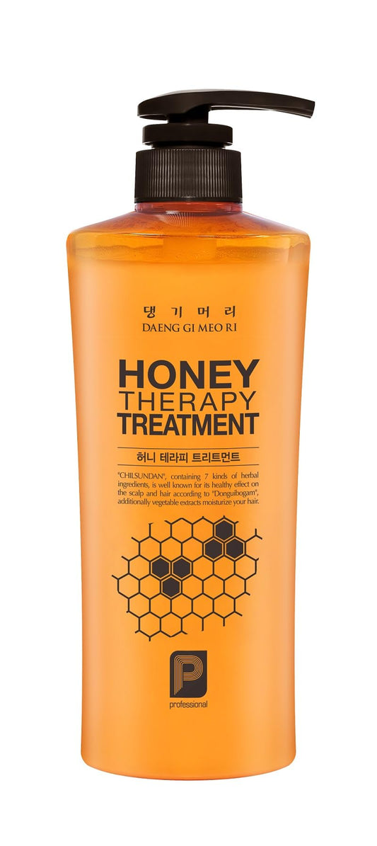 Daeng Gi Meo Ri Honey Therapy bottle close-up shows hydrating formula for hair