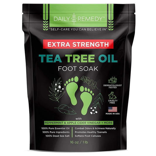 DAILY REMEDY Tea Tree Oil Foot Soak bottle offers a refreshing spa-like experience for feet.
