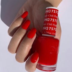 DAISY DND Chili Pepper lacquer bottle complements the gel for a seamless color duo.