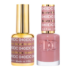Daisy DND DC gel polish sandy brown bottle close-up showing rich pigment.
