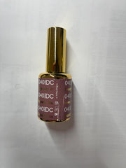 Daisy DND DC sandy brown polish on nails highlights chip-free potential.