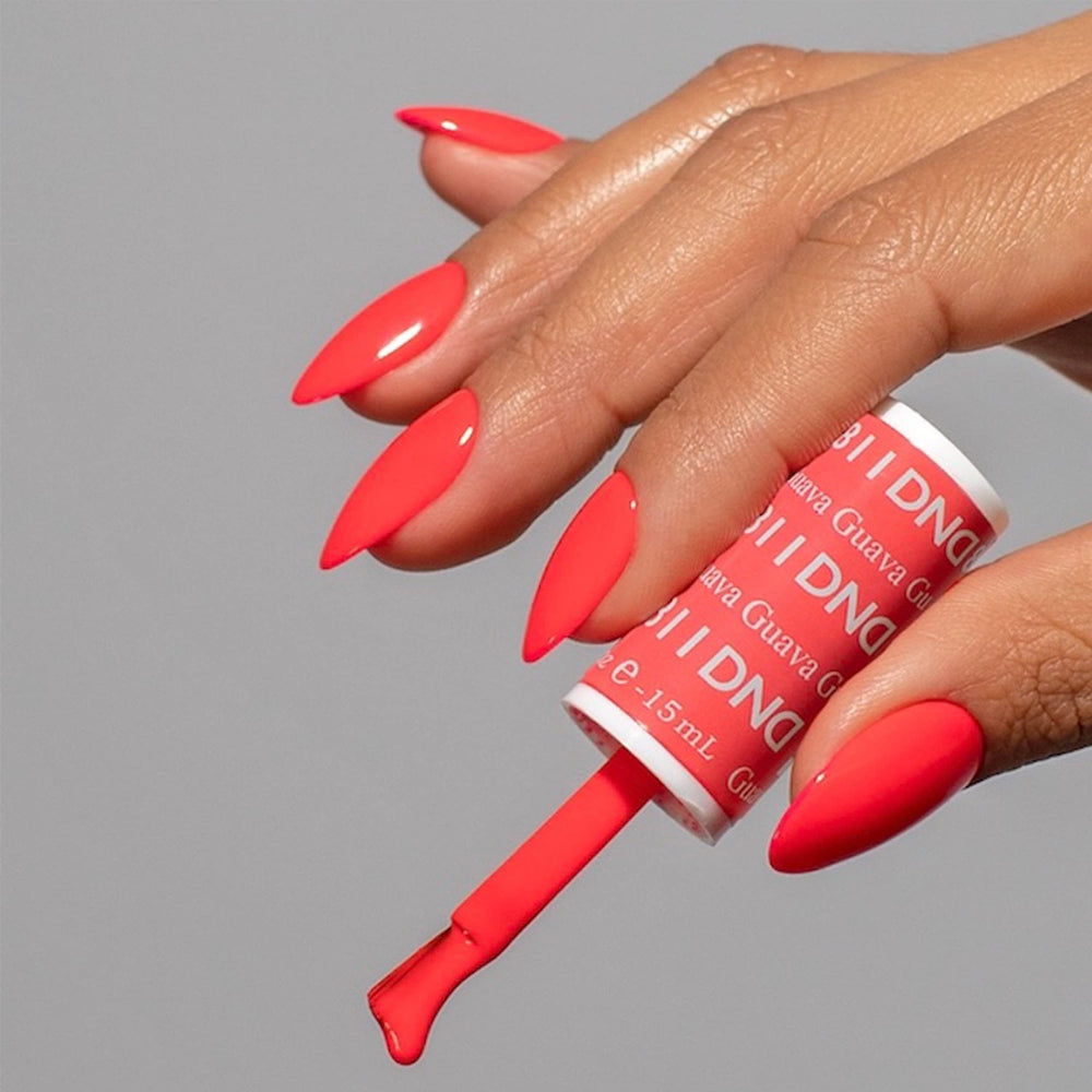 Daisy DND Guava swatch on nail highlights rich pigment and smooth application.