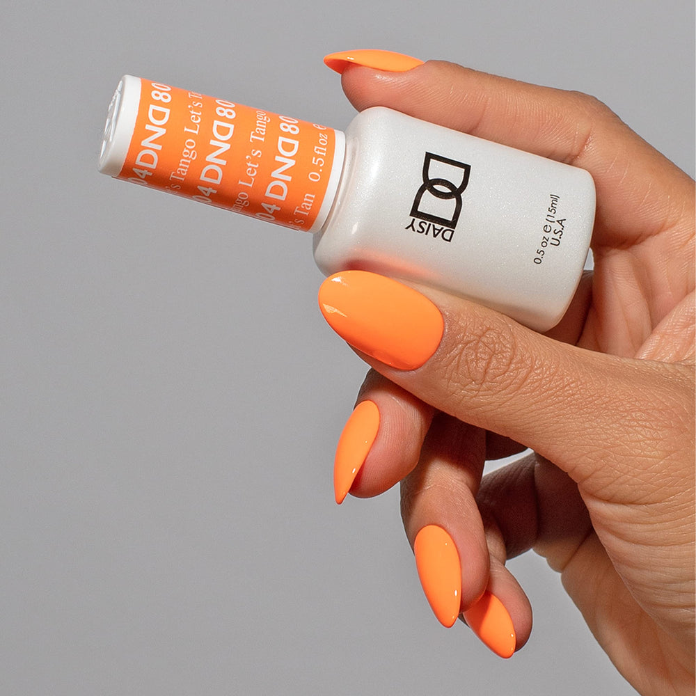 Daisy DND Let’s Tango lacquer bottle paired for a matching finish and easy home manicure.