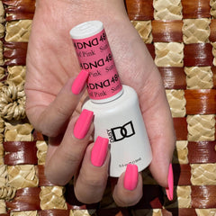 Daisy DND Sun of Pink lacquer bottle complements gel shade for quick top-up