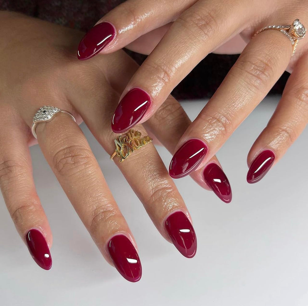 Daisy DND Wineberry duo swatch display demonstrates coordinated color for a cohesive manicure.
