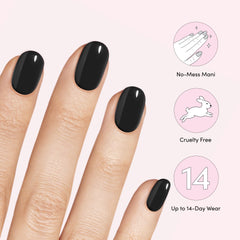 Pressing Dashing Diva Gloss nail strip onto nail for instant color and shine.