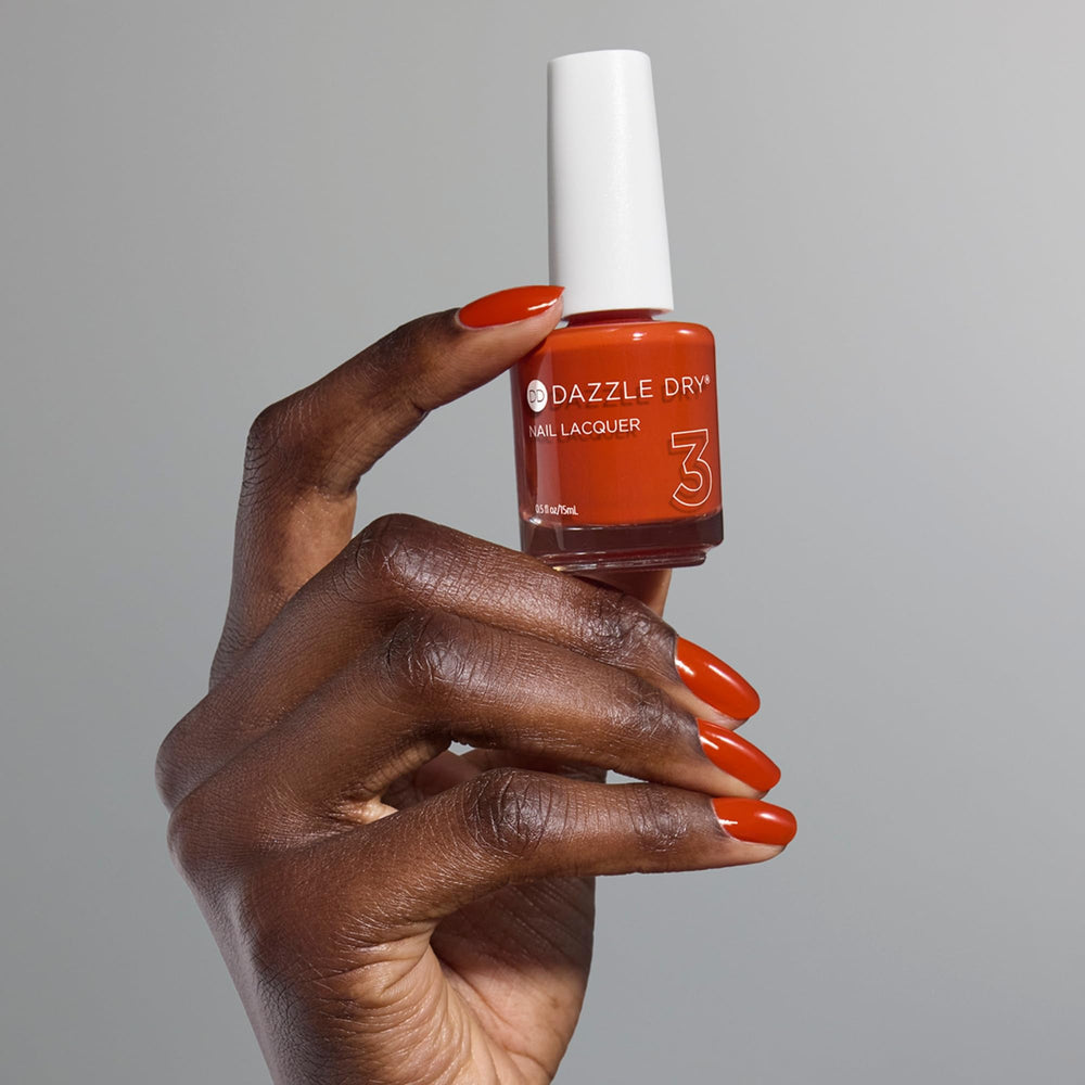 Dazzle Dry four-step system packaging signals a complete manicure solution.