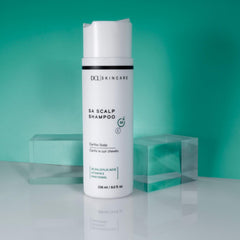 DCL Scalp Therapy Shampoo packaging emphasizes dermatologist-tested formula