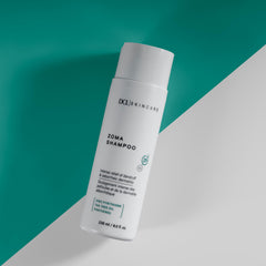 DCL Zoma ingredients swatch graphic emphasizing zinc pyrithione-based dandruff control.