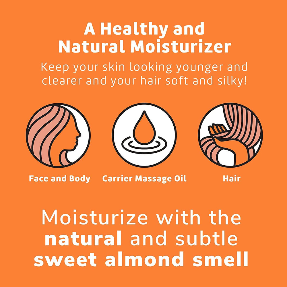 De La Cruz Sweet Almond Oil on hair for natural shine.