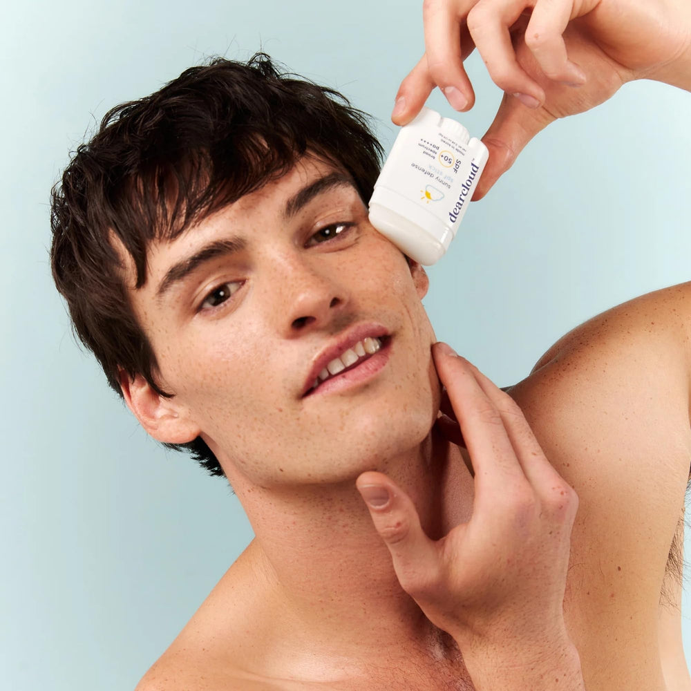 dearcloud Sunny Defense Sunscreen Stick vegan and cruelty-free branding on label.