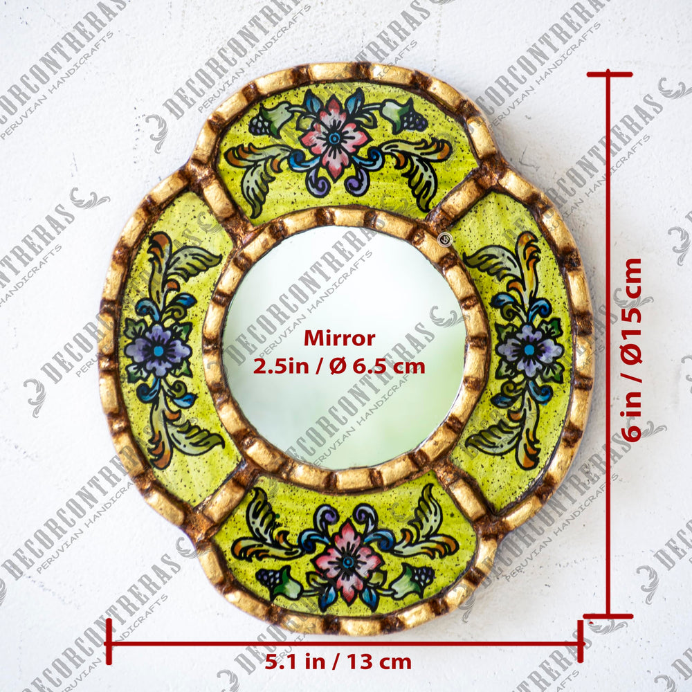 DecorContreras artisan mirror by Edmundo Contreras with bronze leaf frame detail.
