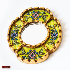 DecorContreras small oval mirror ready-to-hang in entryway or hallway.